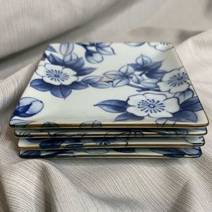 Set of 4 floral appetizer plates.